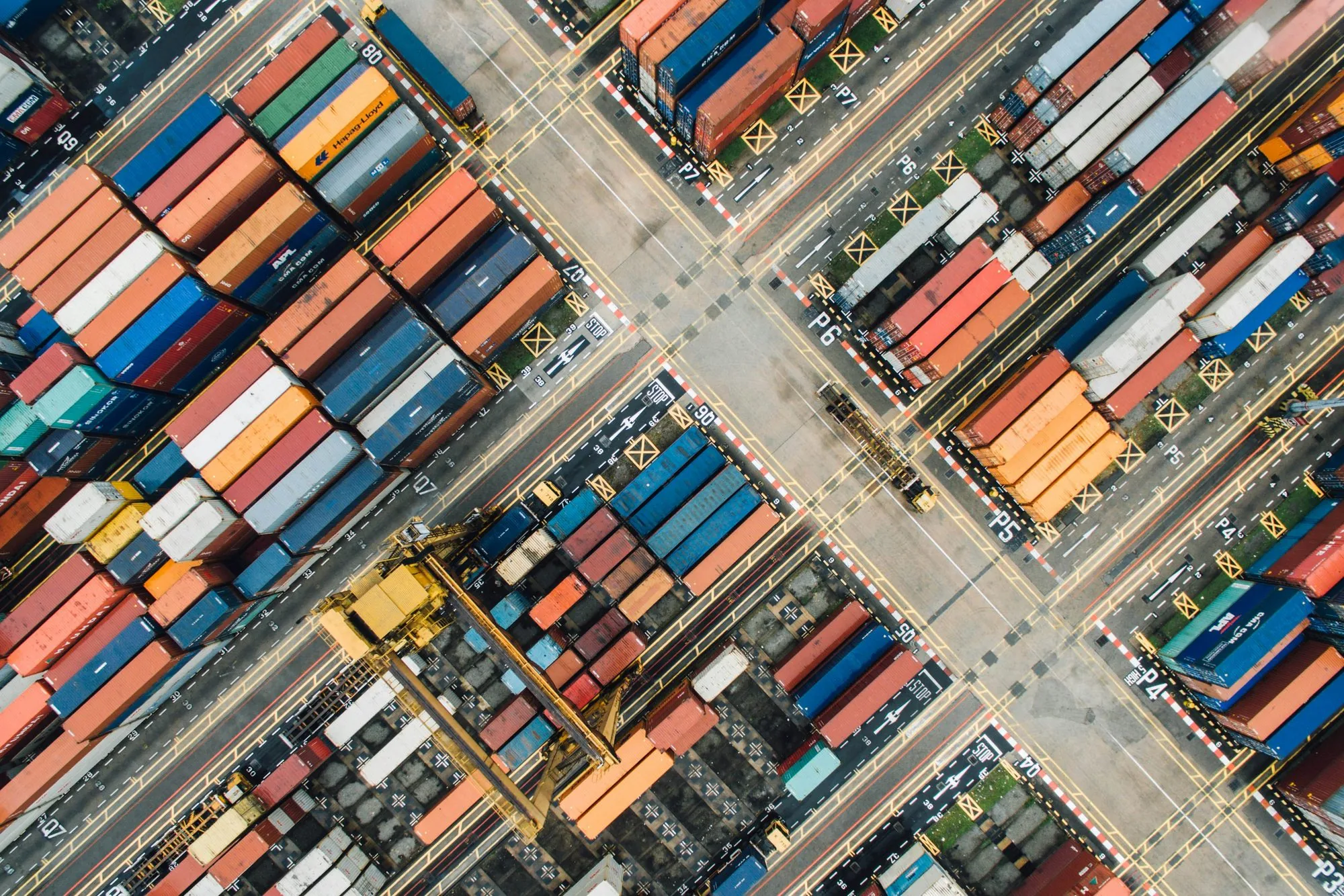 Overhead aerial of a container yard laid out in a grid
